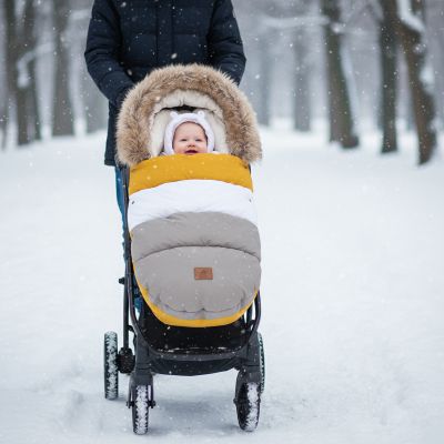 bebe-paisible-chanceliere-poussette-cosyride-jaune-parc-neige